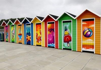 graffiti beach huts